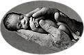 picture of a tiny baby held with two hands